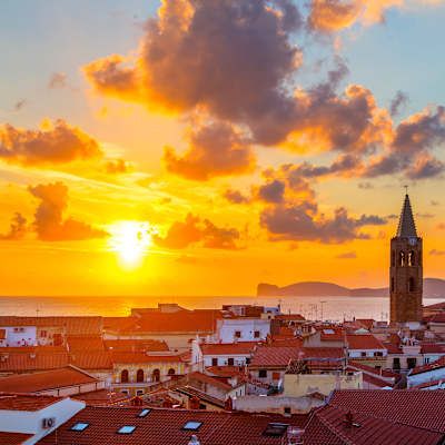 sunset or sunrise over italian town of sardinia alghero italy