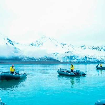 Small excursion boats in the icy Alaska water