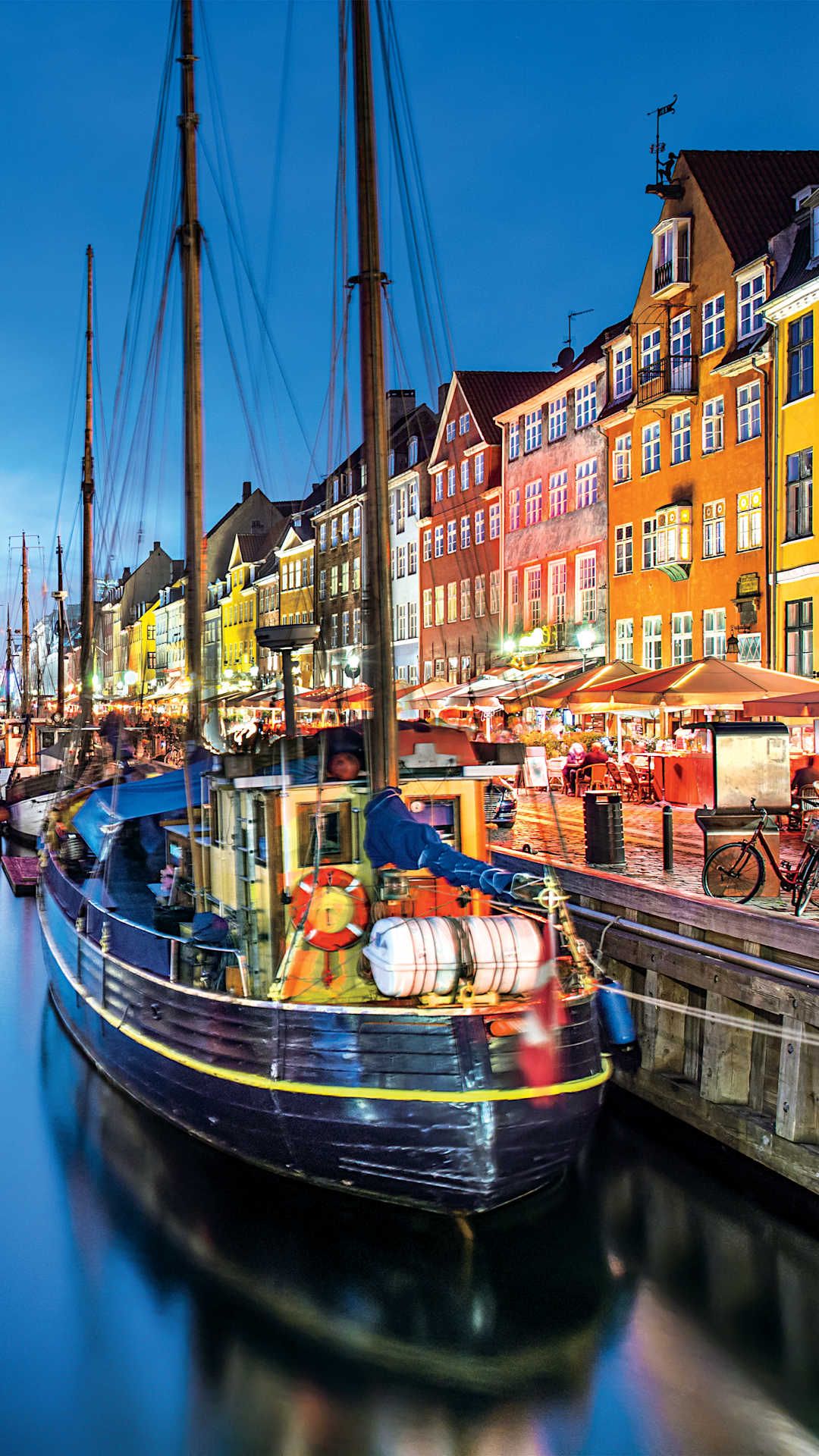 nighttime boat docked in copenhagen